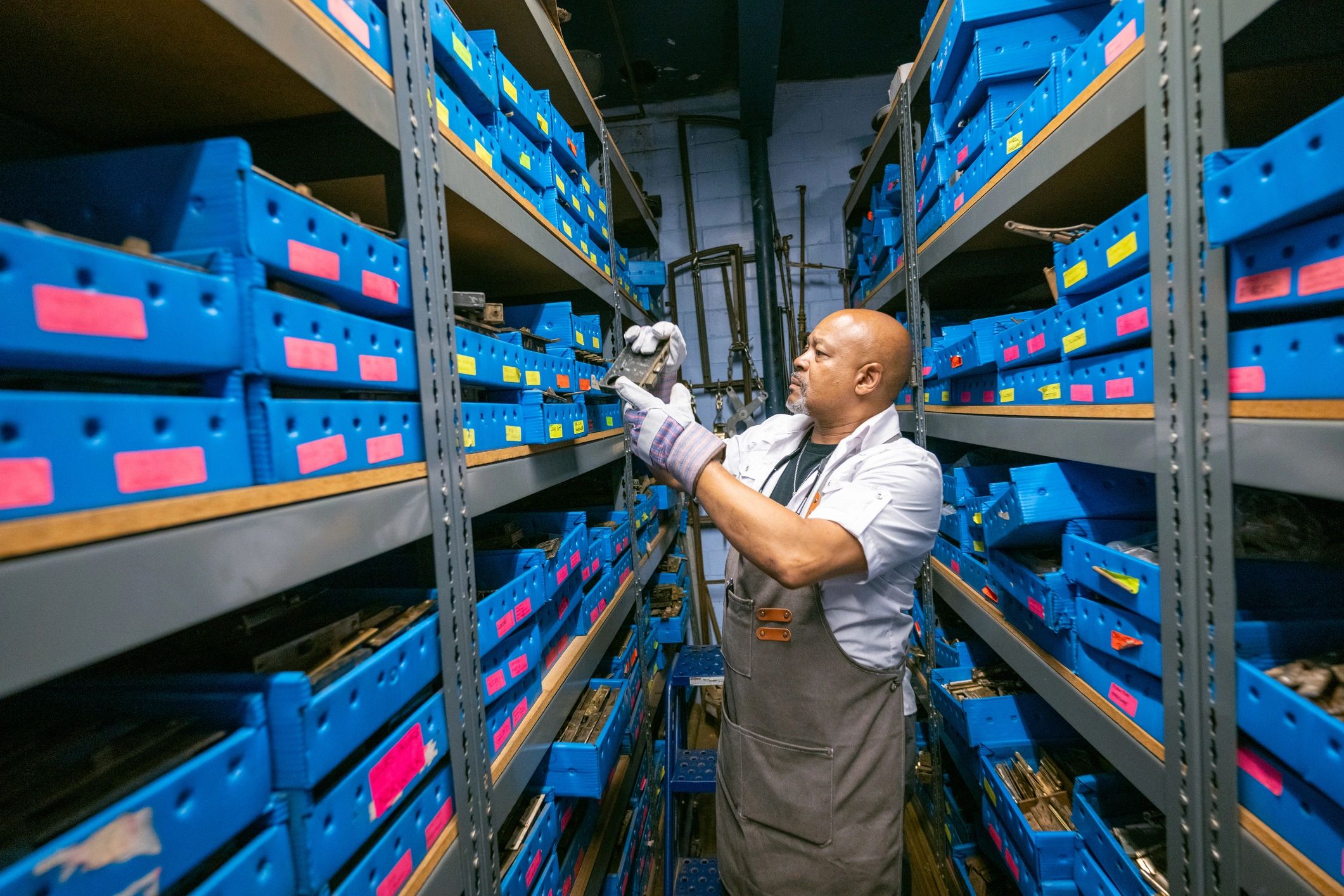 Technician inspecting an item for service