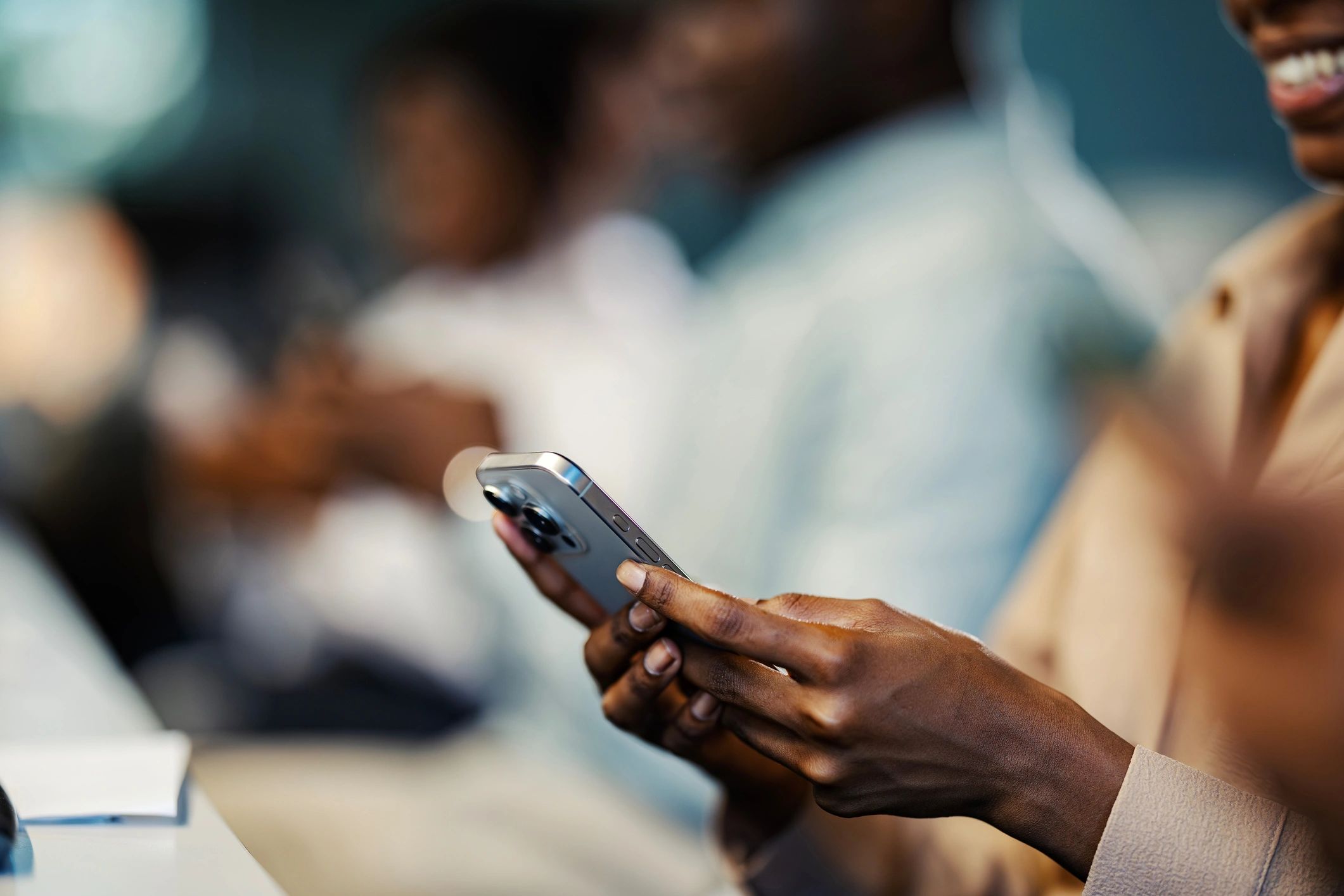 Hands using a smartphone while browsing online